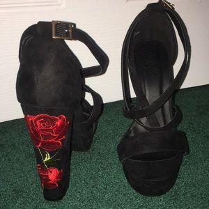 Black Platform heels with rose detailing on heel